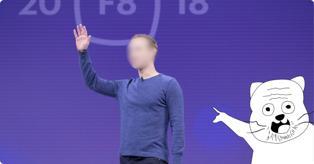 Mark Zuckerberg waving on stage at F8 2018, face blurred, with a cartoon cat pointing at him