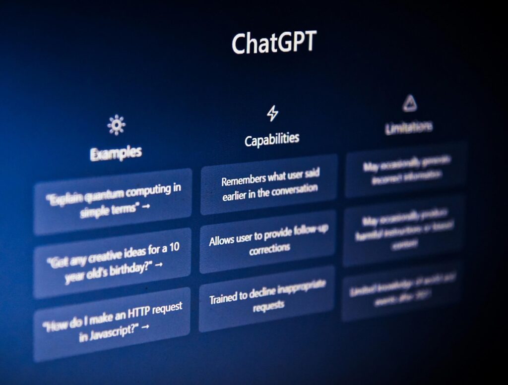 A ChatGPT welcome screen listing Capabilities, including “Remembers what user said earlier in the conversation”