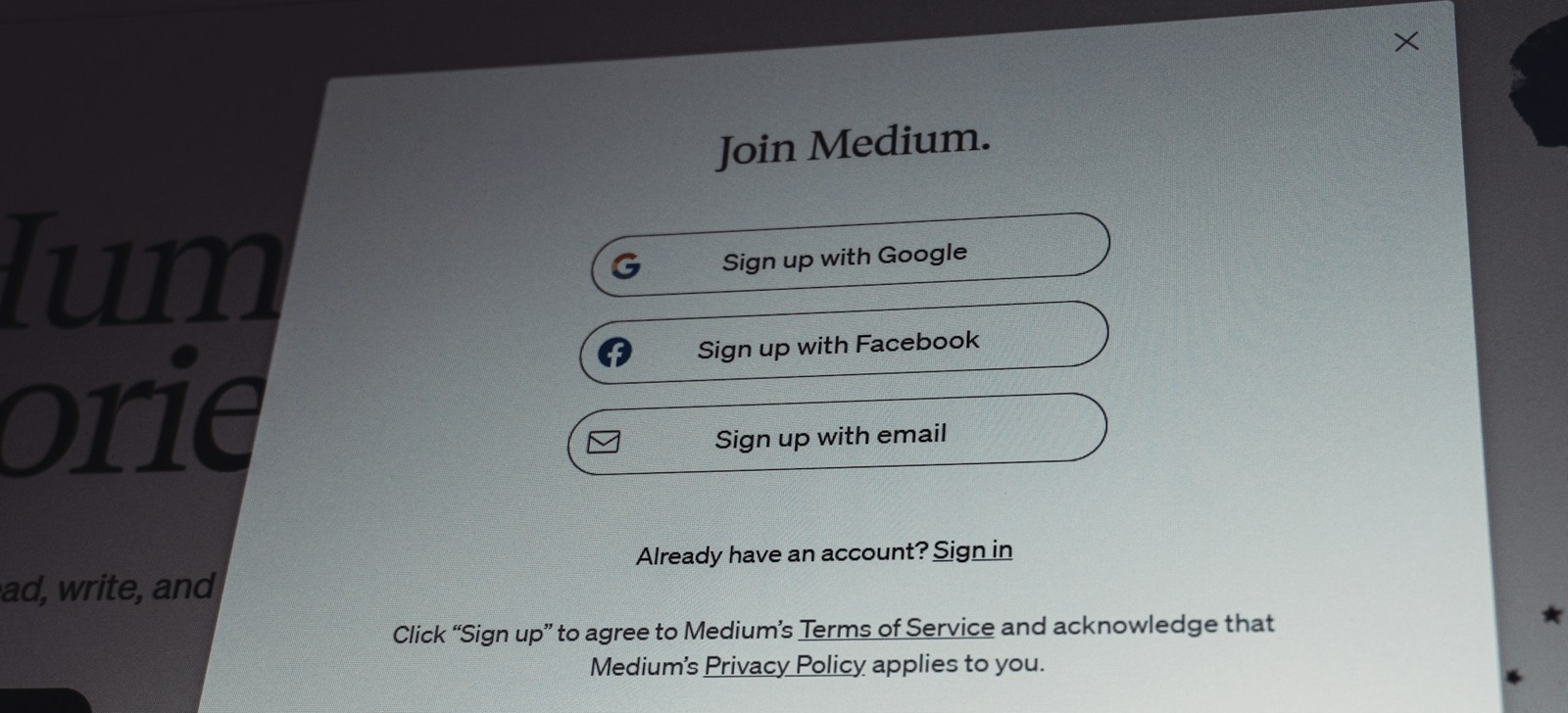 Medium's signup dialog offering Sign up with Google, Sign up with Facebook, or Sign up with email