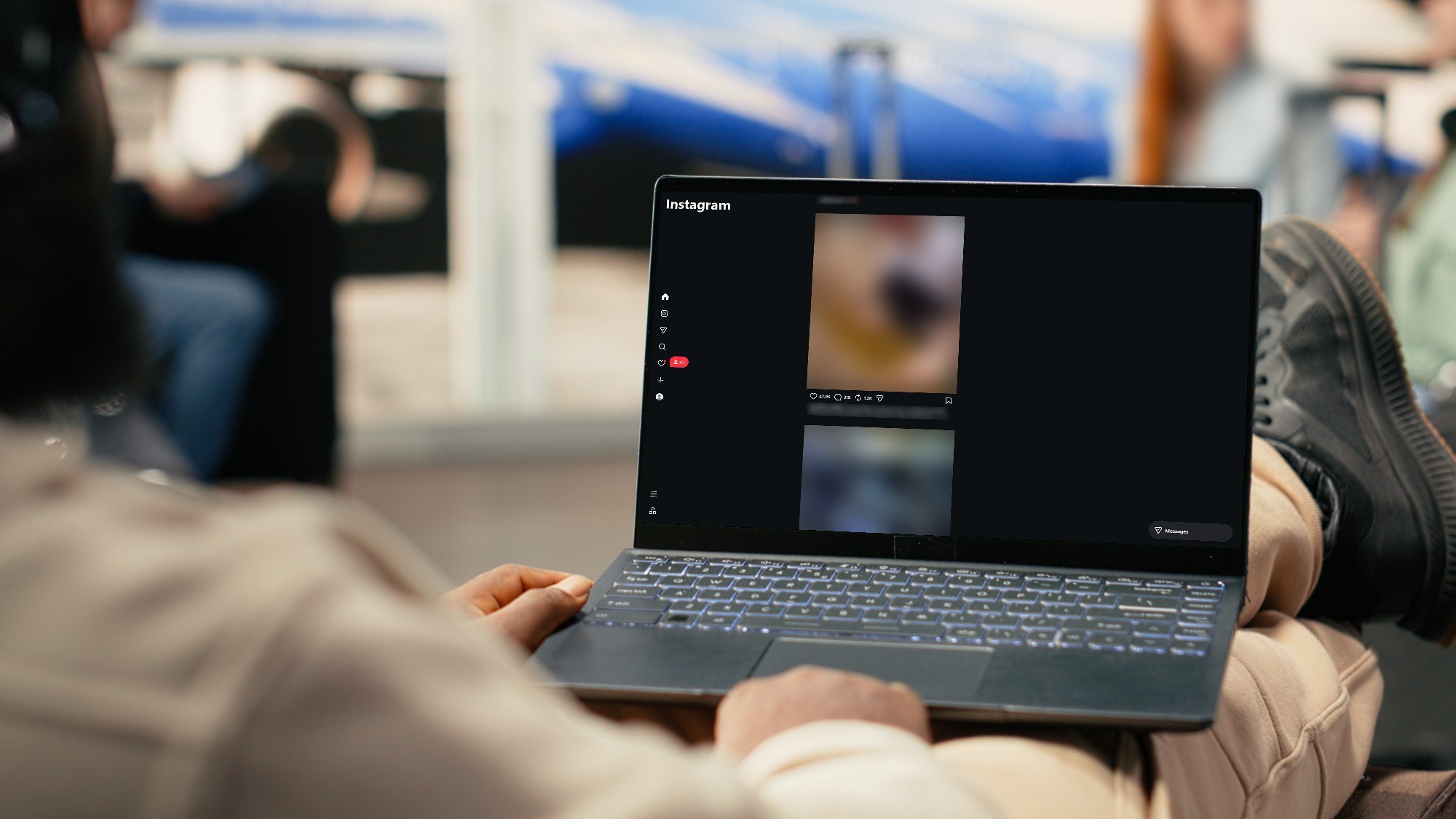 A person scrolling an Instagram feed on a laptop