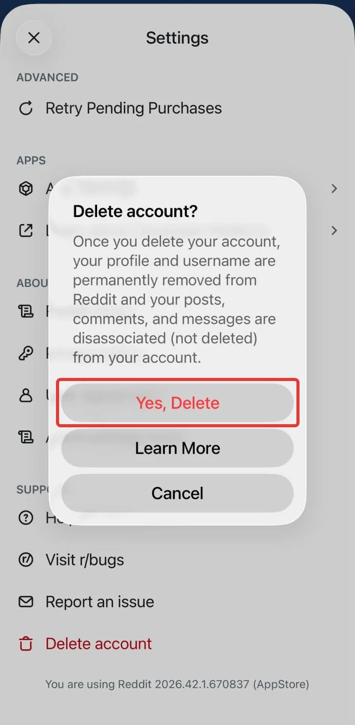 The Delete account? dialog in the Reddit iPhone app, saying posts, comments and messages are disassociated, not deleted, with Yes, Delete boxed in red above Learn More and Cancel