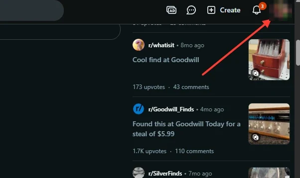 The top of Reddit's home feed, with a red arrow pointing to the profile picture at the top right, next to the notifications bell