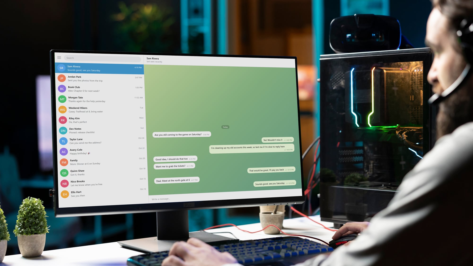 A person at a desk looking at a Telegram chat on a desktop computer